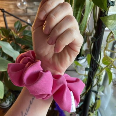 woman wearing pink Margaret Valley scrunchie on arm